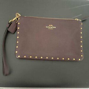 Coach studded wristlet, chocolate brown